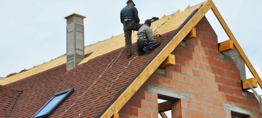 best roofers near me in Vancouver, working on the roof.