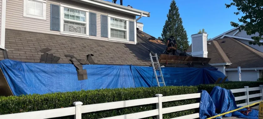 Professional roof inspection in Vancouver checking shingles, flashing, gutters, and roof condition