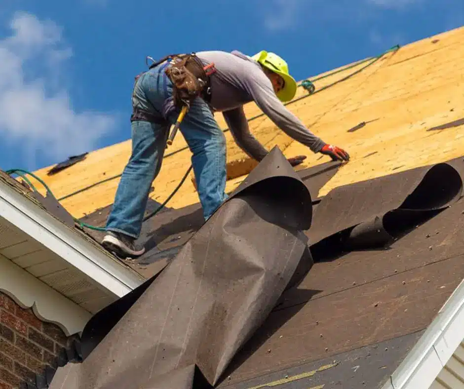 Roof underlayment installed beneath shingles during a roofing project
